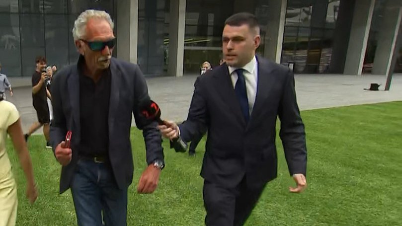 Sam Wood’s father, Andrew Wood, speaks to 7NEWS reporter Michael Hammond outside court.
