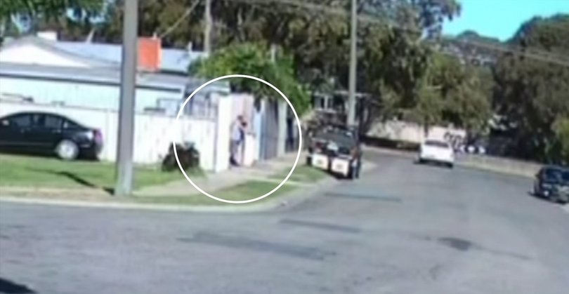 Footage appears to show a man firing a single round.
